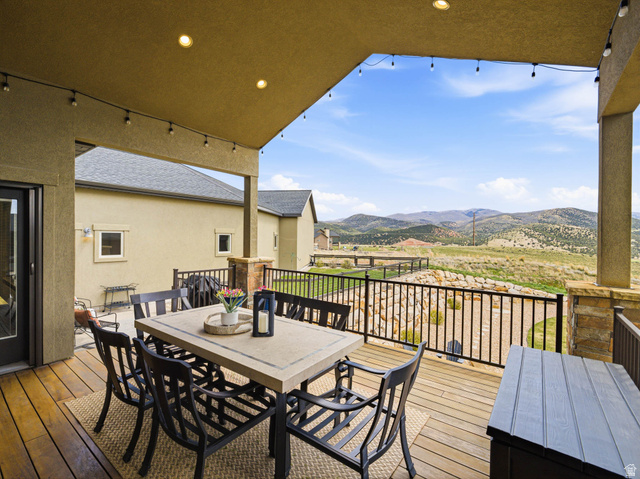 402 Shadow Hill Road Wanship, UT 84017 - Photo 73 of 90 Wooden deck with outdoor dining space and a mountain view