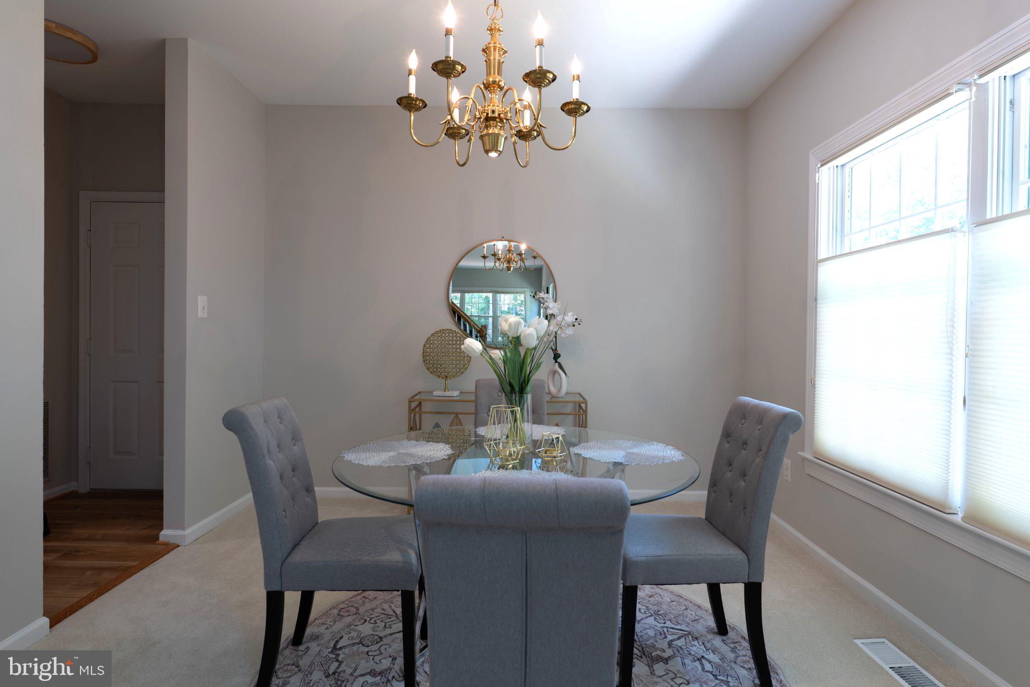 1211 Woodbrook Court Reston, VA 20194 - Photo 17 of 21 Elegant dining space with natural light.