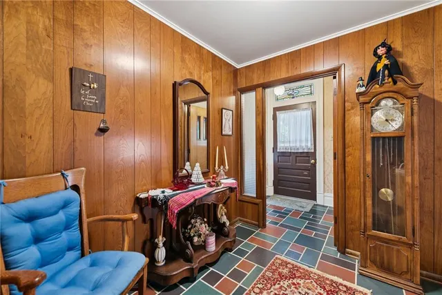 a view of a livingroom with furniture and windows