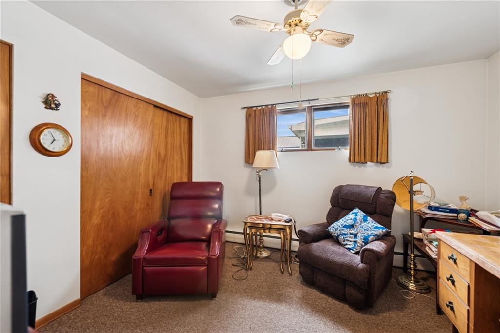340 Weldon Street Latrobe, PA 15650 - Photo 13 of 26 a view of a livingroom with furniture and a ceiling fan