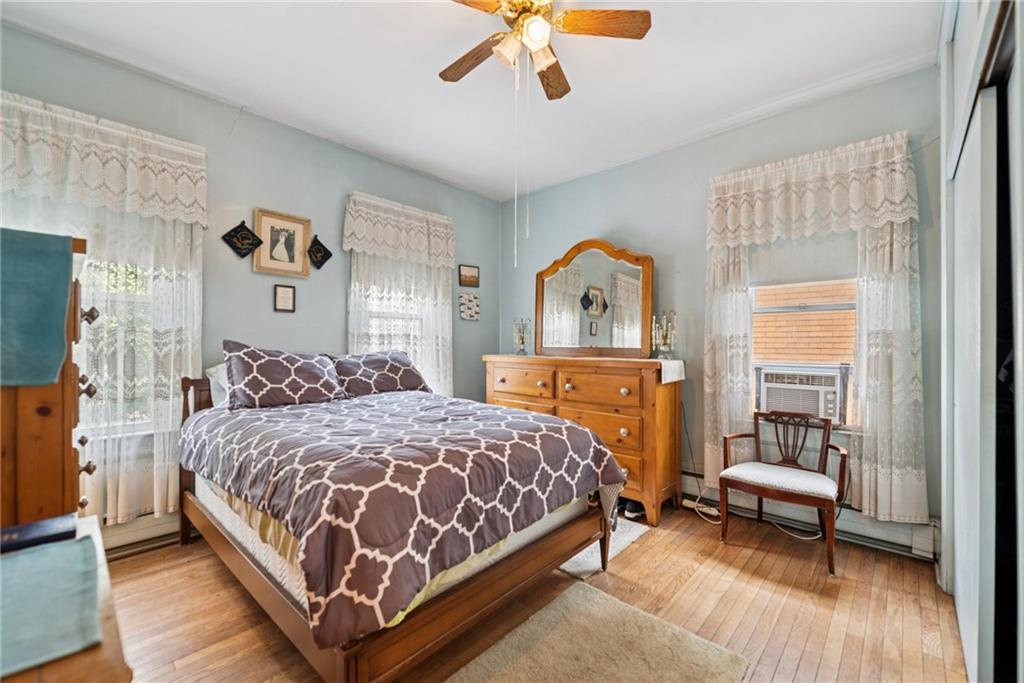 340 Weldon Street Latrobe, PA 15650 - Photo 16 of 26 a bedroom with a bed couch and a window