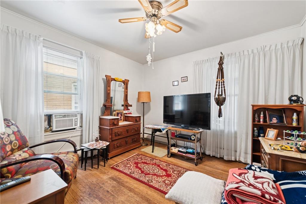 340 Weldon Street Latrobe, PA 15650 - Photo 18 of 26 a living room with furniture and a flat screen tv