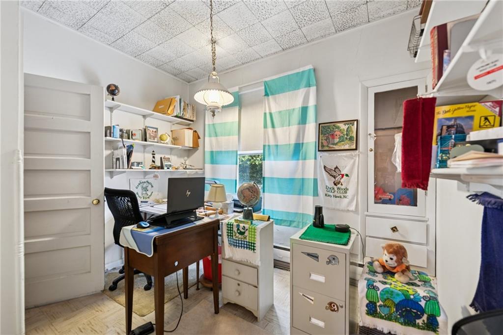 340 Weldon Street Latrobe, PA 15650 - Photo 21 of 26 a room with furniture a rug and a window