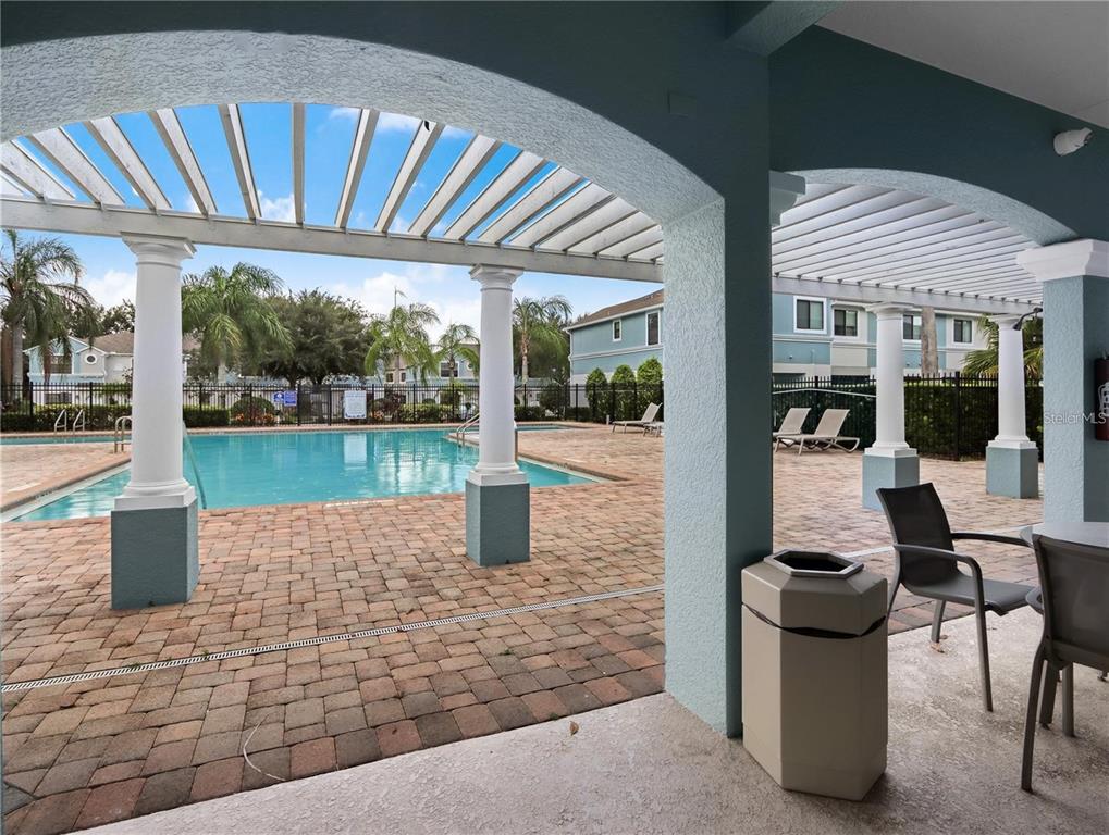 3321 Windleshore Way Sanford, FL 32773 - Photo 15 of 20 a view of a patio with dining table and chairs