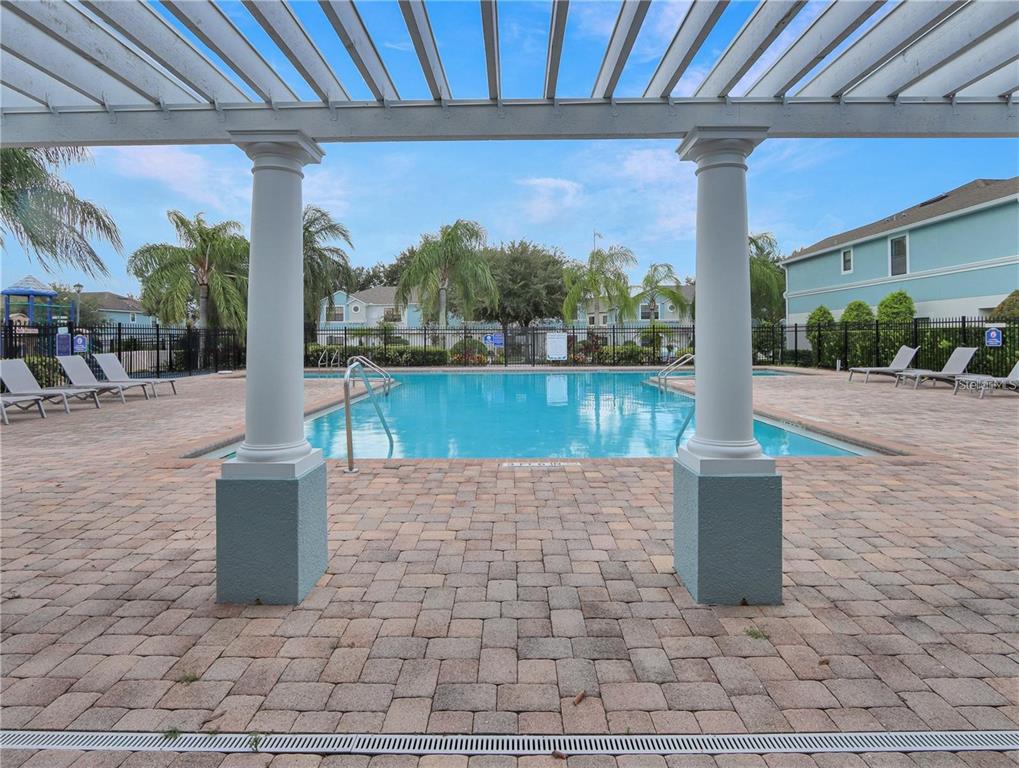 3321 Windleshore Way Sanford, FL 32773 - Photo 16 of 20 a view of a patio with a table and chairs