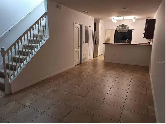 a view of a kitchen with kitchen