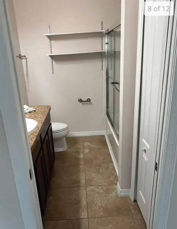 3321 Windleshore Way Sanford, FL 32773 - Photo 6 of 20 a bathroom with a sink and toilet