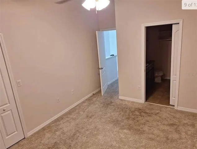 an empty room with a bathroom