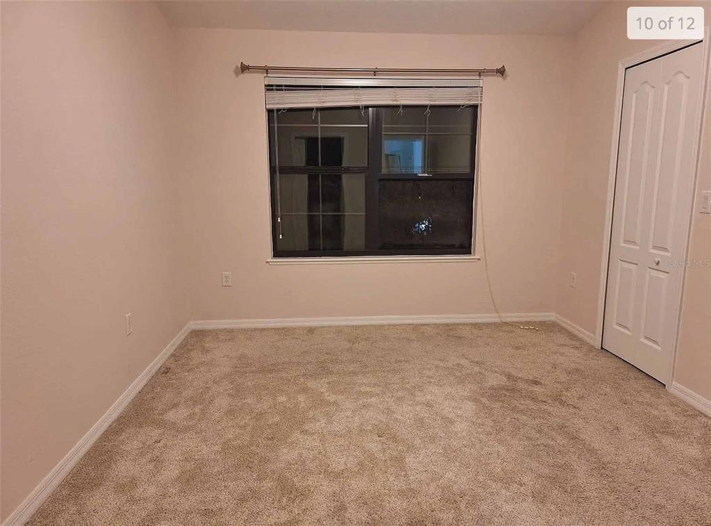 3321 Windleshore Way Sanford, FL 32773 - Photo 8 of 20 a view of an empty room with a window