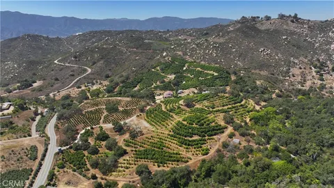 an aerial view of residential house and outdoor space
