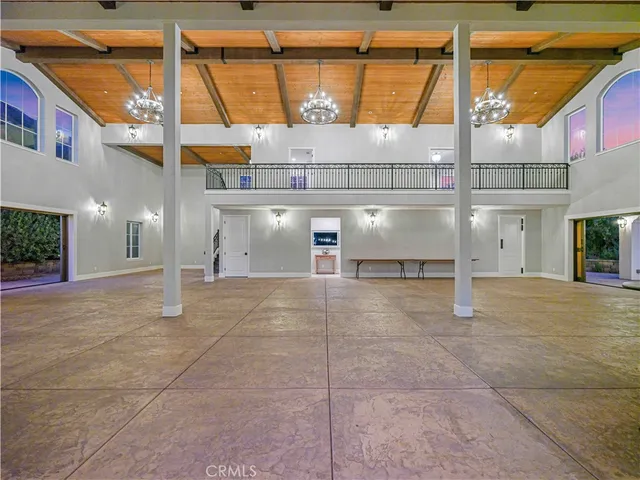 a view of a parking space with a street