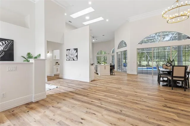 a view of a dining room with furniture and window