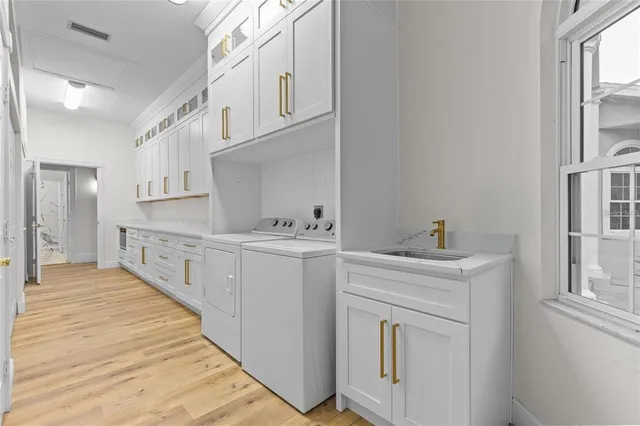a bathroom with a granite countertop sink a toilet and a mirror