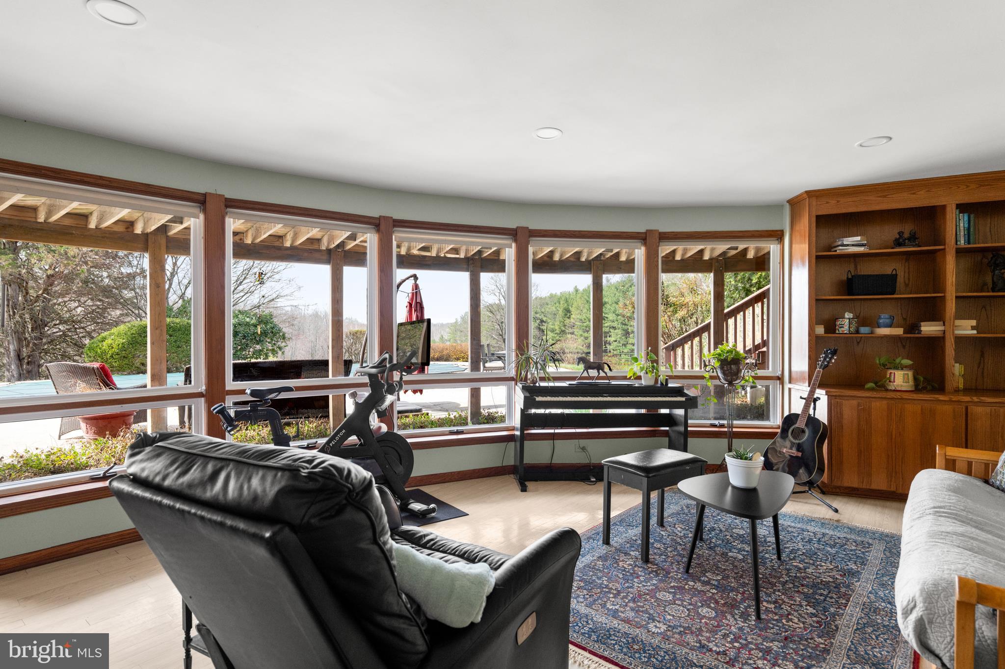 10803 Crest Hill Road Marshall, VA 20115 - Photo 12 of 30 a living room with furniture and large windows