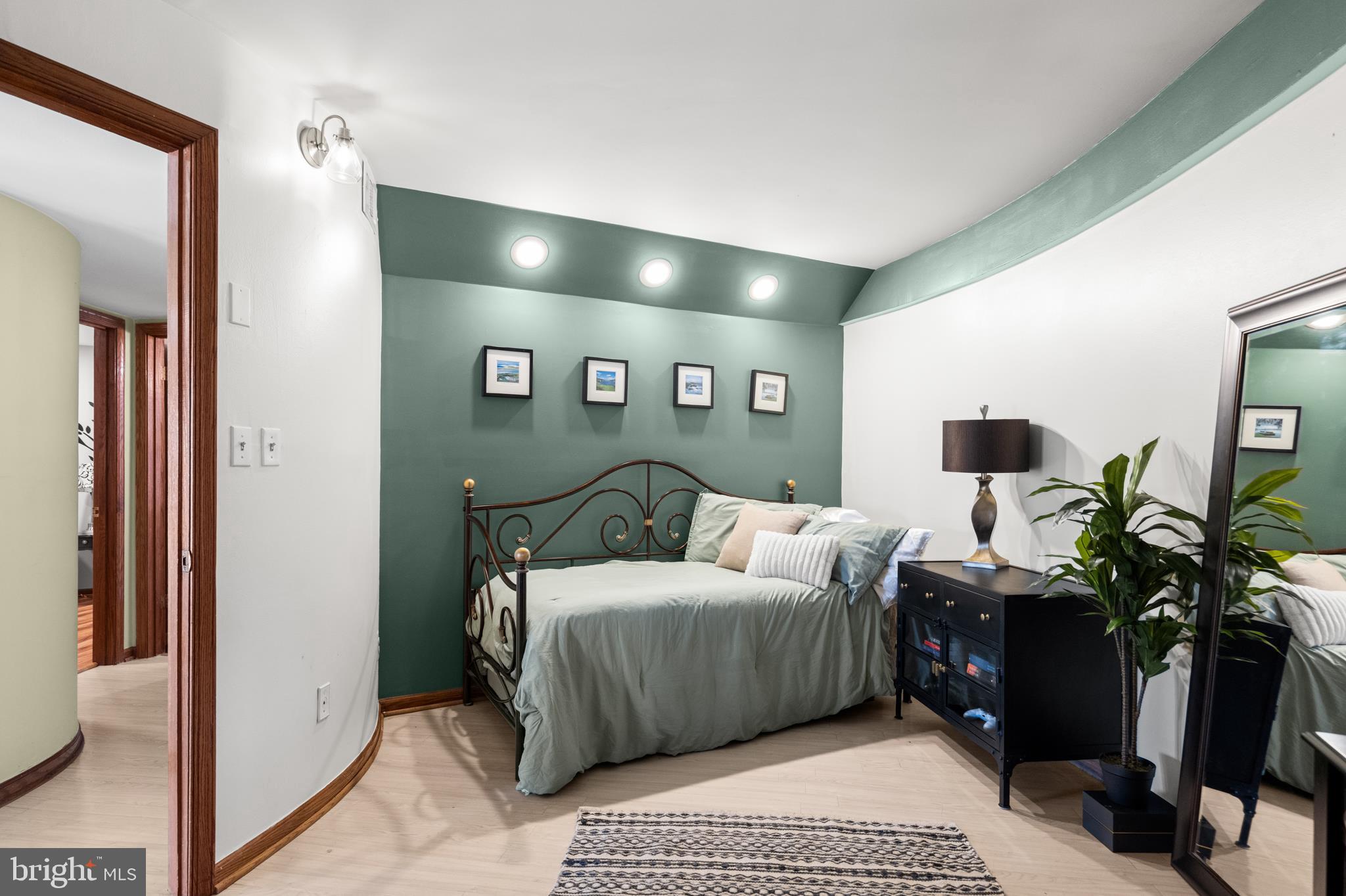 10803 Crest Hill Road Marshall, VA 20115 - Photo 15 of 30 a bedroom with a bed and a chandelier