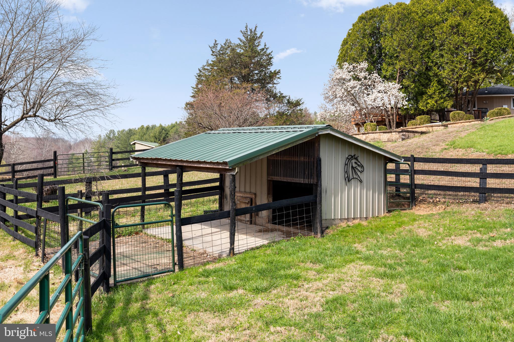 10803 Crest Hill Road Marshall, VA 20115 - Photo 24 of 30 a view of backyard with deck and outdoor seating