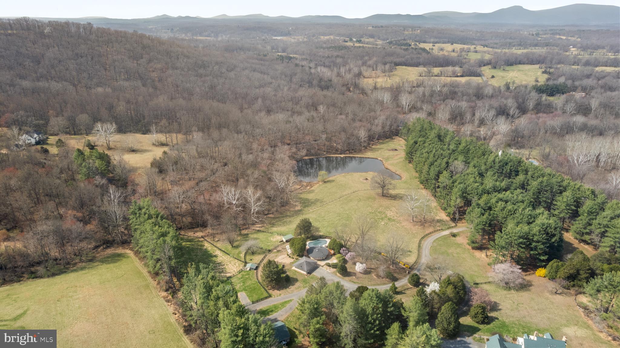 10803 Crest Hill Road Marshall, VA 20115 - Photo 27 of 30 a view of a lake with mountains in the background