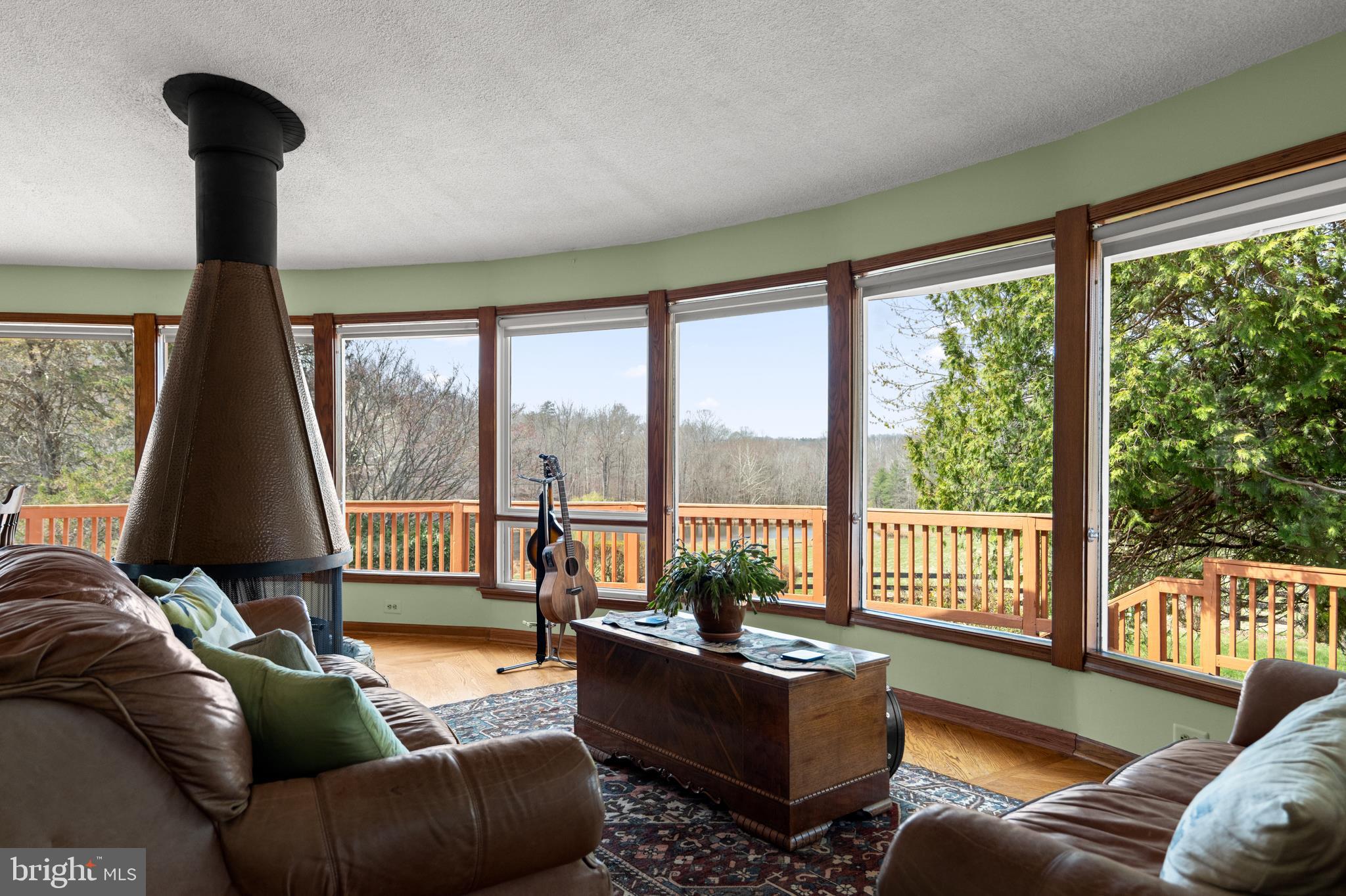 10803 Crest Hill Road Marshall, VA 20115 - Photo 6 of 30 a living room with furniture and a floor to ceiling window