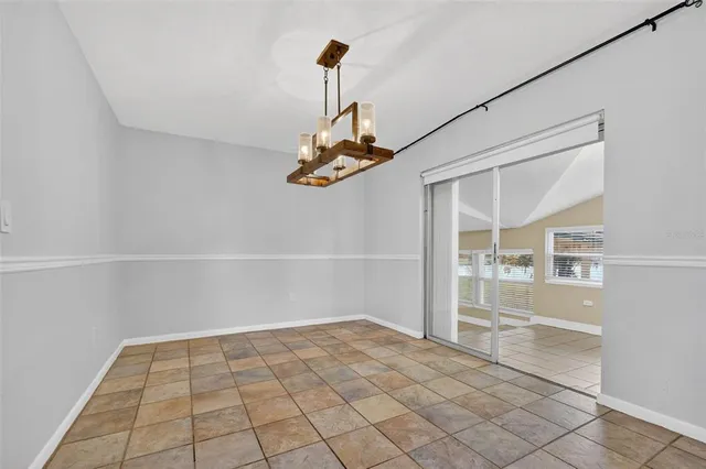 a kitchen with stainless steel appliances granite countertop a sink and a stove