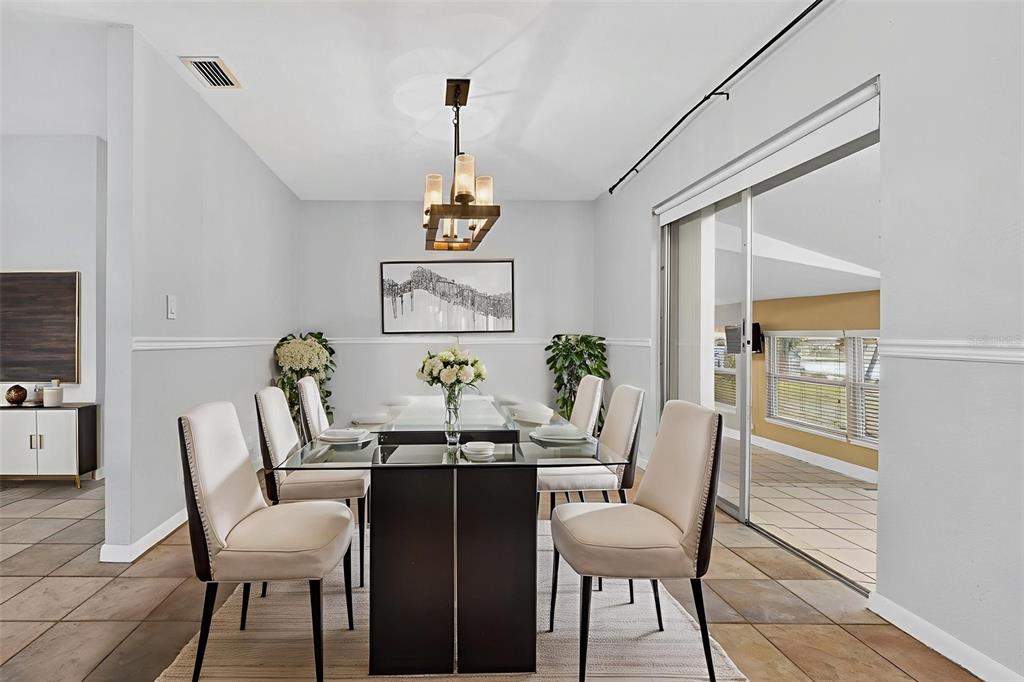 309 North 8th Street Dundee, FL 33838 - Photo 14 of 91 a view of a dining room with furniture