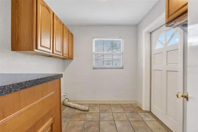 a white toilet sitting next to a shower