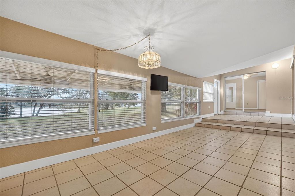 309 North 8th Street Dundee, FL 33838 - Photo 25 of 91 a view of an empty room with a window