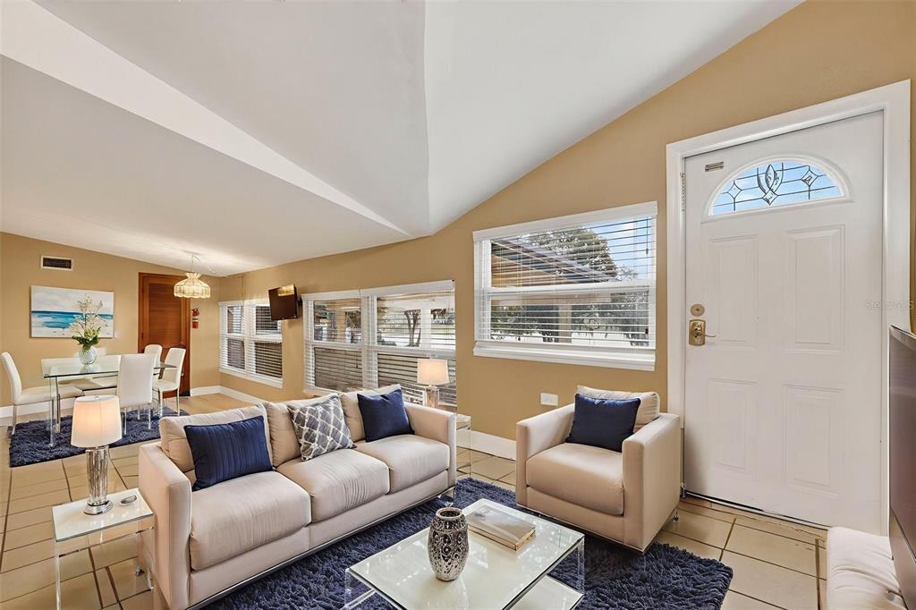 309 North 8th Street Dundee, FL 33838 - Photo 29 of 91 a living room with furniture and a window