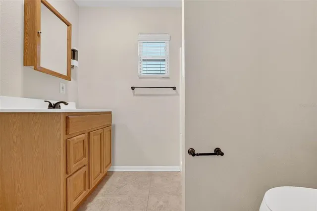 a front view of a house with yard