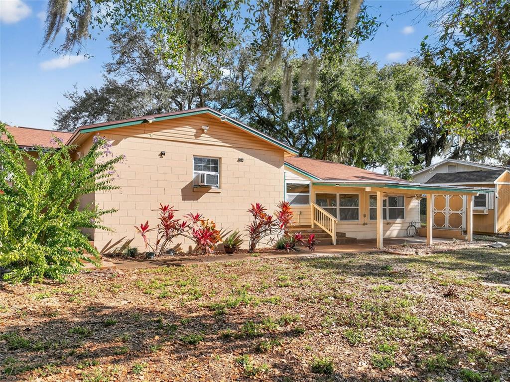309 North 8th Street Dundee, FL 33838 - Photo 69 of 91 a front view of a house with yard