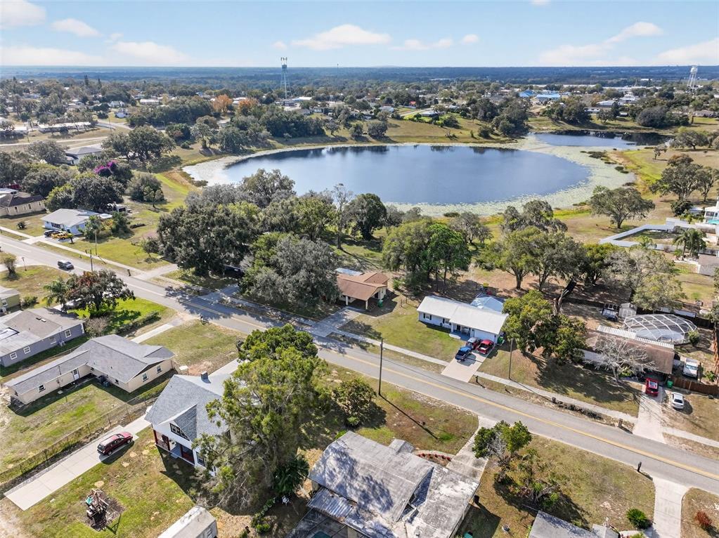 309 North 8th Street Dundee, FL 33838 - Photo 87 of 91 an aerial view of residential houses with outdoor space