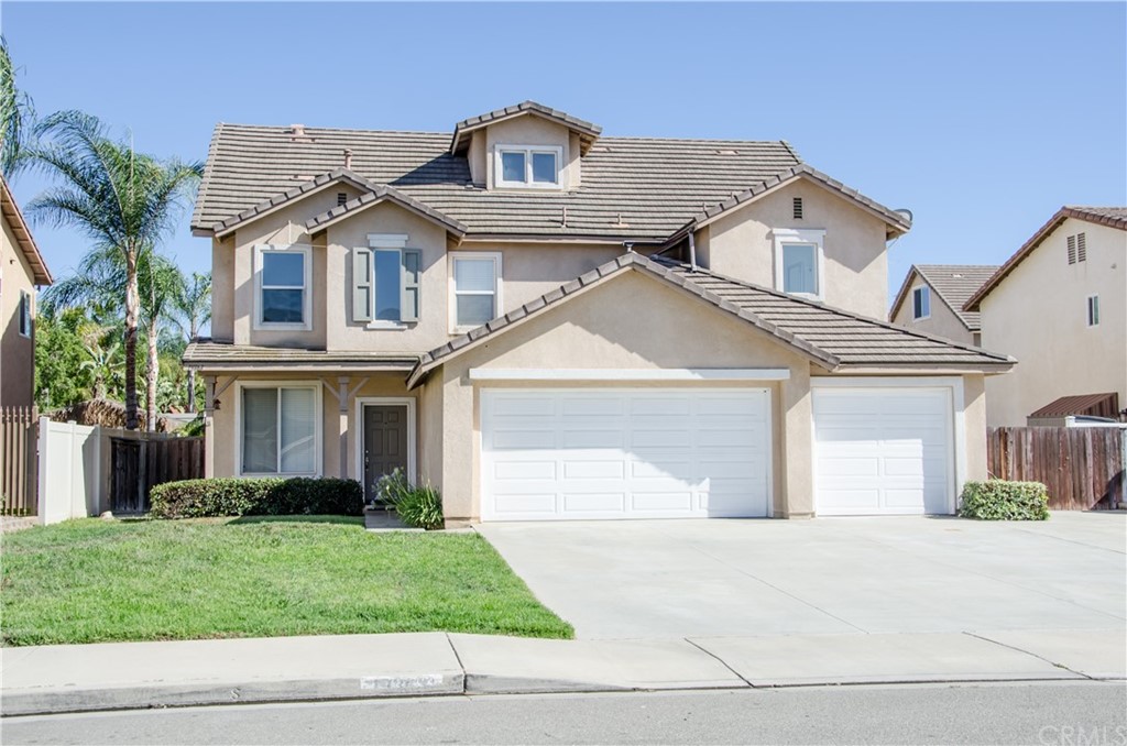 19363 De Marco Road Riverside, CA 92508 - Photo 1 of 1 a front view of a house with a yard and garage