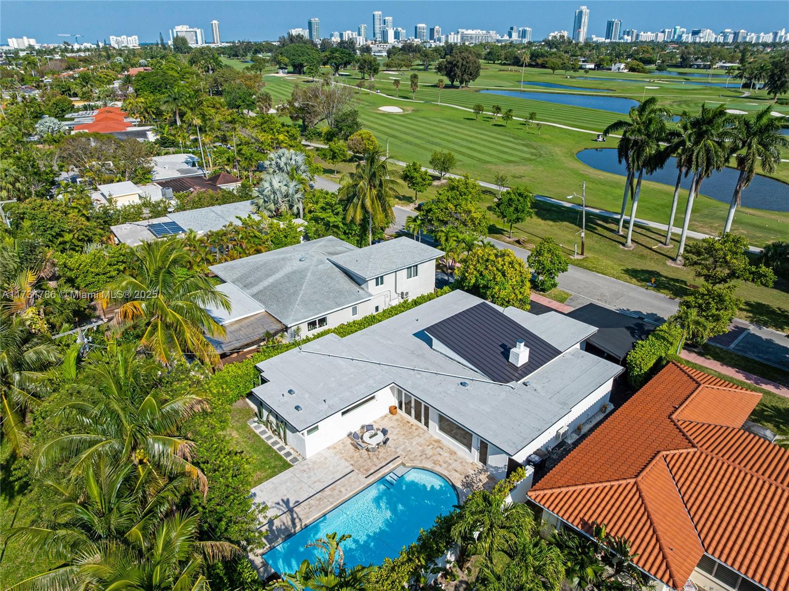 835 Fairway Drive Miami Beach, FL 33141 - Photo 35 of 39 an aerial view of a house with a garden