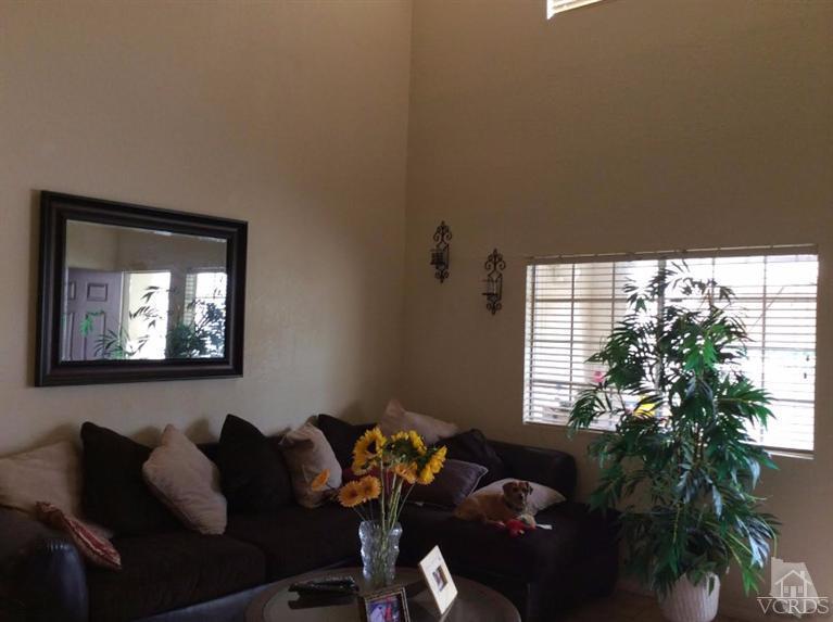 1175 Fitzgerald Road, Unit E Simi Valley, CA 93065 - Photo 16 of 24 a living room with furniture and a potted plant