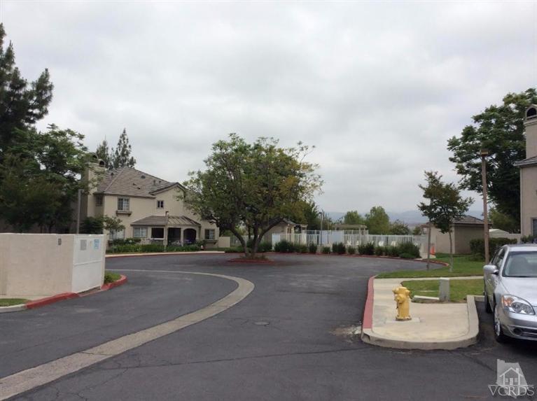 1175 Fitzgerald Road, Unit E Simi Valley, CA 93065 - Photo 20 of 24 an outdoor view of a house with basket ball court