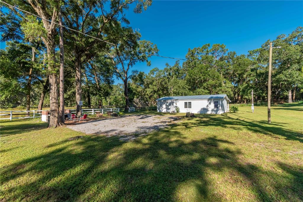 8081 Southwest 41st Place Road Ocala, FL 34481 - Photo 34 of 50 a view of a park with large trees