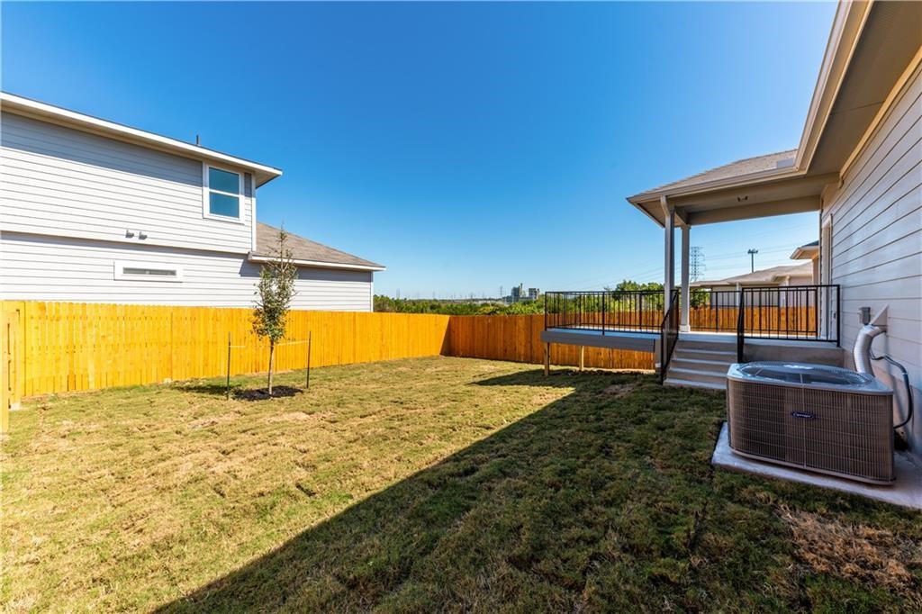 8304 Mimi Lane Austin, TX 78724 - Photo 20 of 32 a view of a backyard of a house