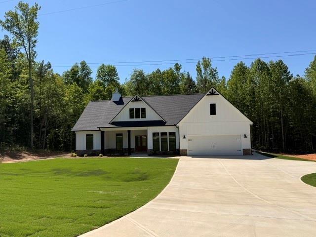 644 Perkins Road Dallas, GA 30157 - Photo 1 of 1 front view of a house with a yard