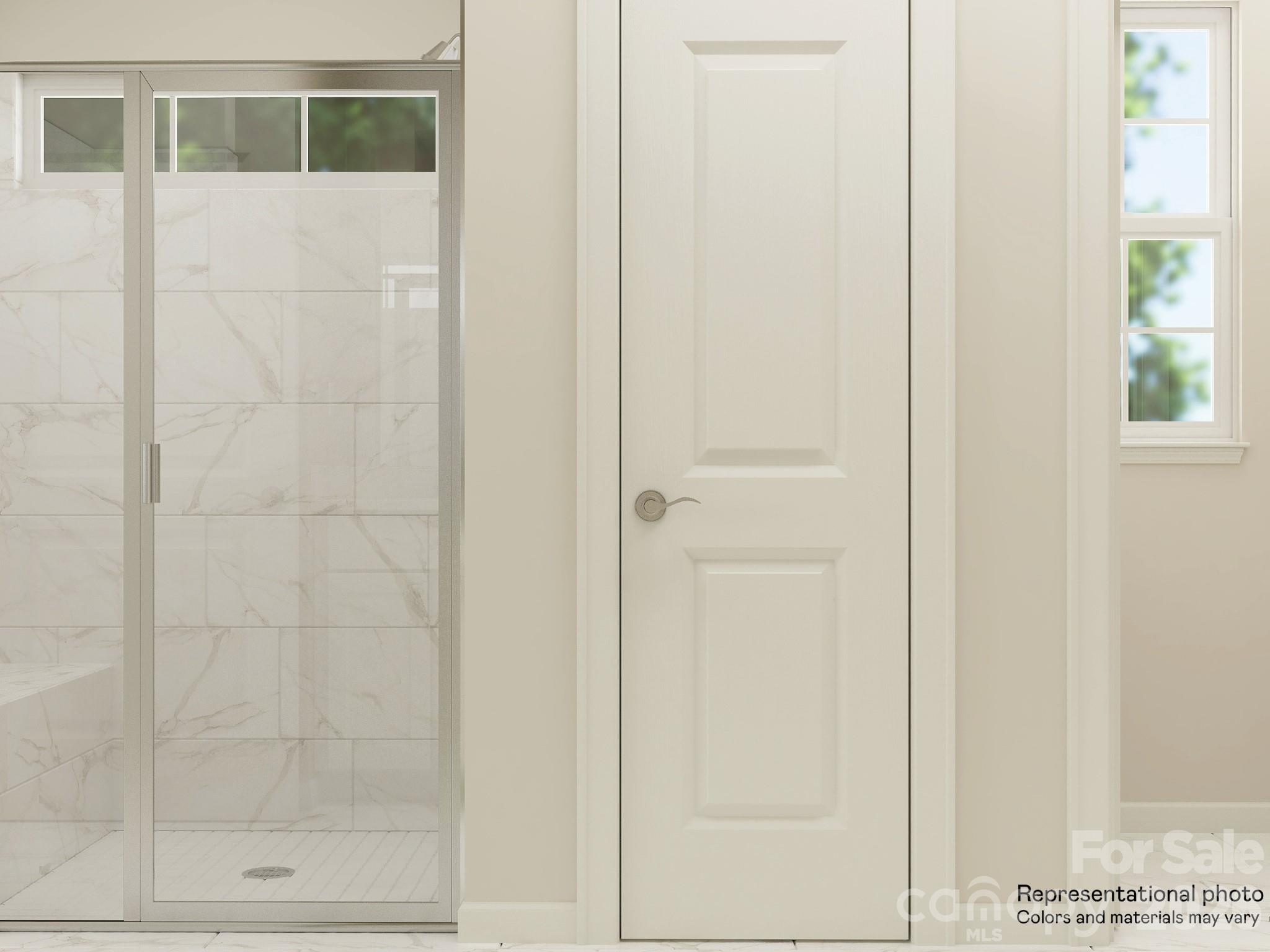 5434 Redbud Road, Unit 69 Lancaster, SC 29720 - Photo 17 of 18 a bathroom with a glass door