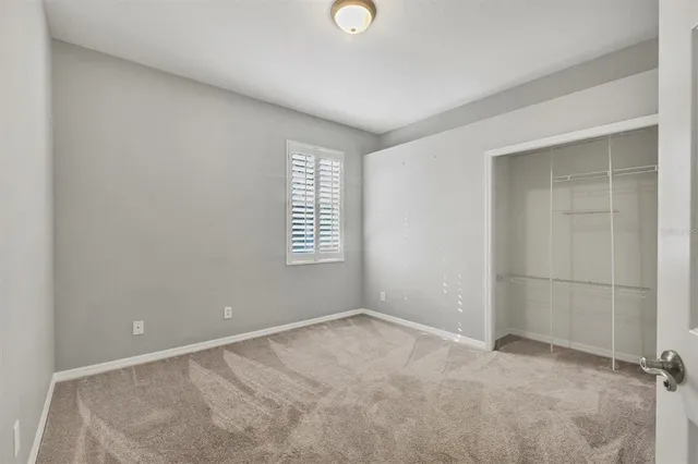 wooden floor and window in a room