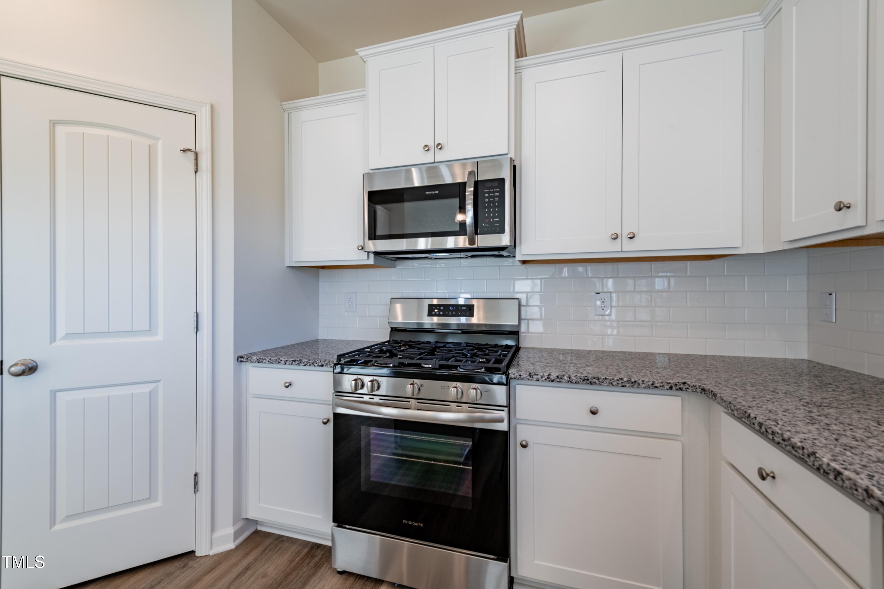 308 Johnson Rdg Way Four Oaks, NC 27524 - Photo 16 of 46 019_Kitchen