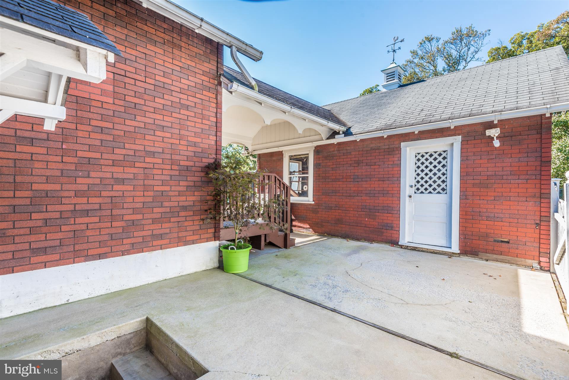 9402 North Laurel Road Laurel, MD 20723 - Photo 27 of 30 Side Garage and Patio