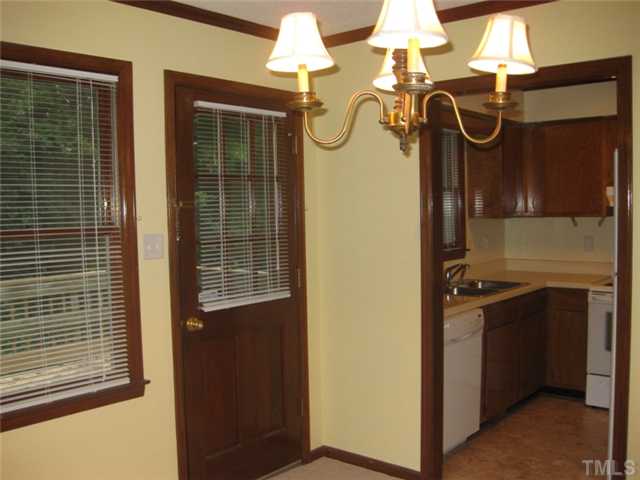 5526 Hamstead Crossing Raleigh, NC 27612 - Photo 22 of 24 a utility room with dryer and washer