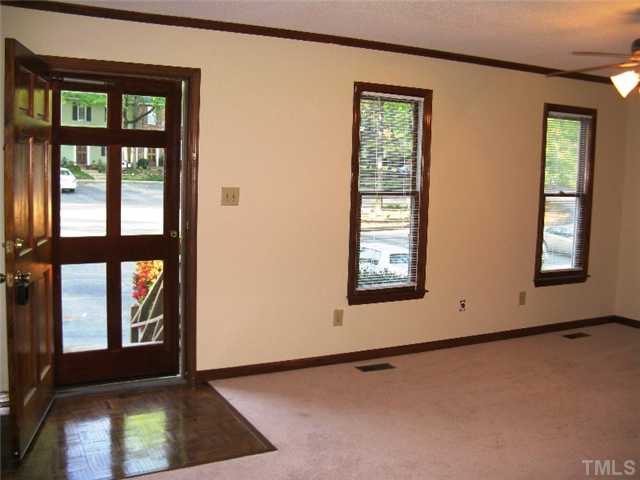 5526 Hamstead Crossing Raleigh, NC 27612 - Photo 7 of 24 an empty room with windows