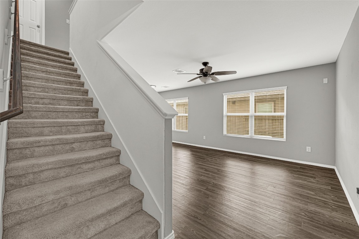 6020 Rimini Landing Lane Porter, TX 77365 - Photo 17 of 33 a view of entryway and hall with wooden floor