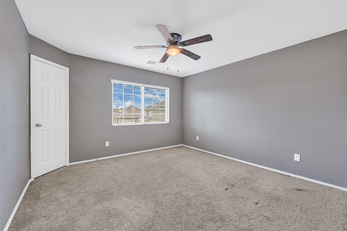 6020 Rimini Landing Lane Porter, TX 77365 - Photo 23 of 33 a view of an empty room with a window