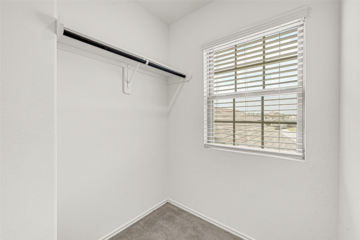 6020 Rimini Landing Lane Porter, TX 77365 - Photo 24 of 33 a small space with a window and a white painted wall