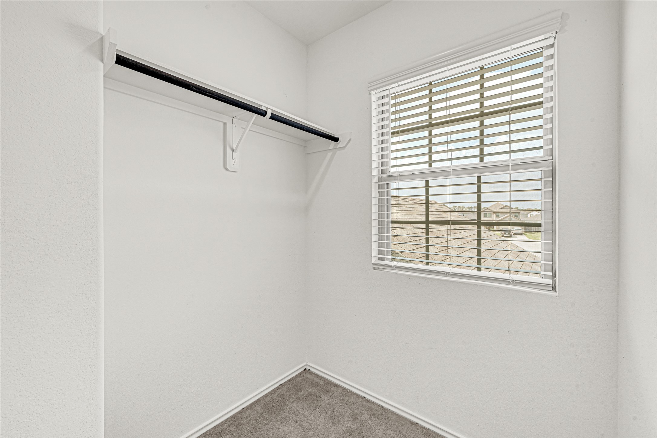 6020 Rimini Landing Lane Porter, TX 77365 - Photo 24 of 33 spacious secondary bedroom closet with natural light flowing in