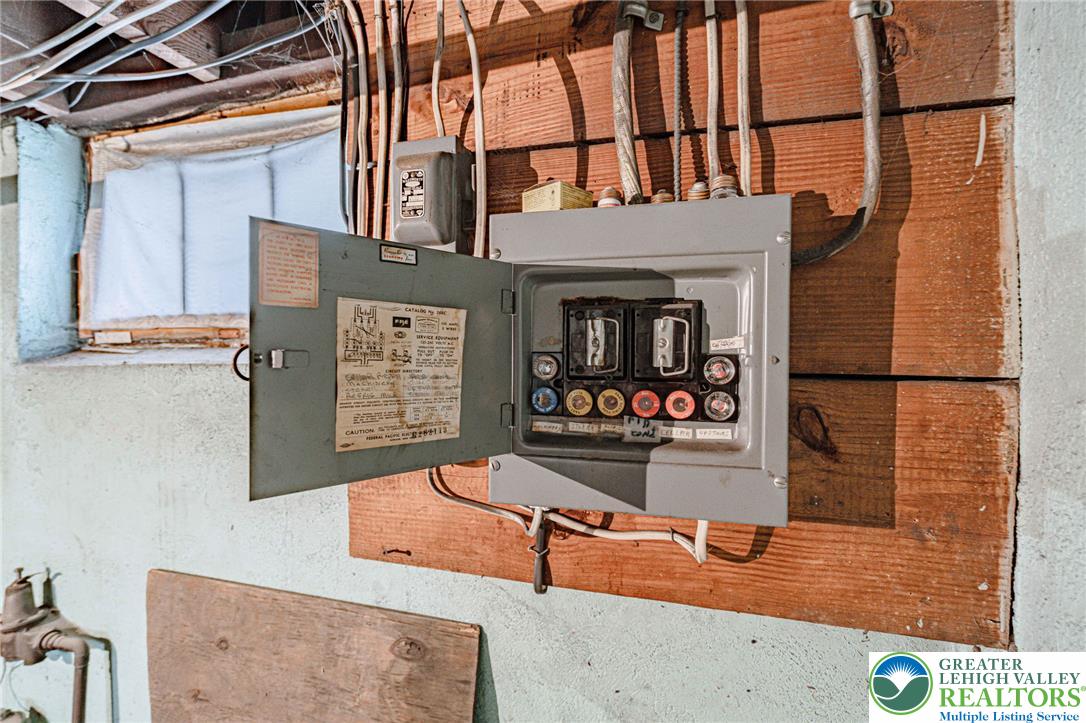 159 West Ridge Street Nesquehoning, PA 18240 - Photo 34 of 55 Essential electrical paneling ensures continuous, reliable power for the property.