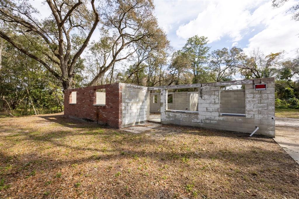 5515 North Falkenburg Road Tampa, FL 33610 - Photo 1 of 8 a view of a house with a yard