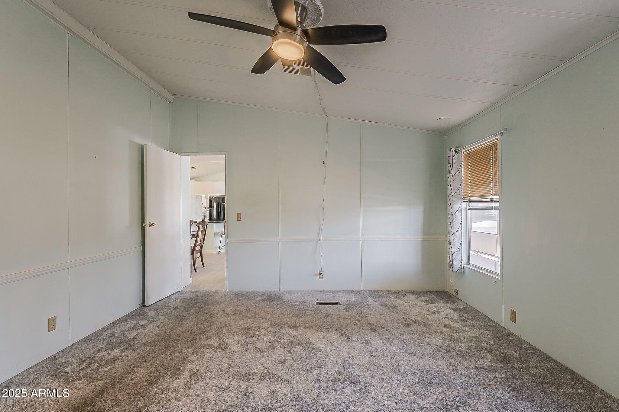 834 South Meridian Road, Unit 118 Apache Junction, AZ 85120 - Photo 35 of 50 a view of empty room with ceiling fan
